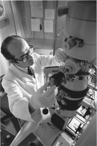 Doctor Khalid Khan adjusting mechnical equipment.