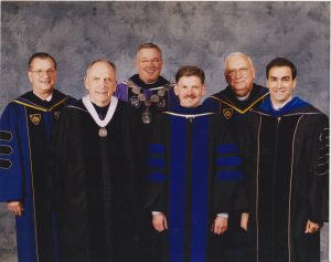 Officers of the University of Portland in academic regalia.