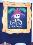 Framed skeleton image for Dia de los Muertos.