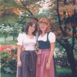 Jamie Macken and Judy Piatz dressed in traditional German dresses or dirndls.