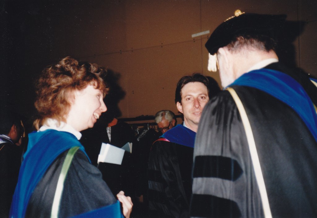 Doctor Becky Houck and Doctor Herman Asarnow in academic regalia.
