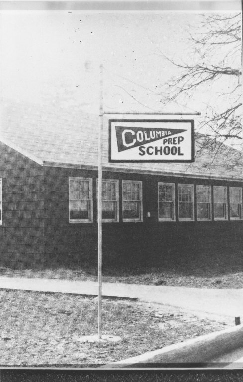 Columbia Prep School sign on sign post.
