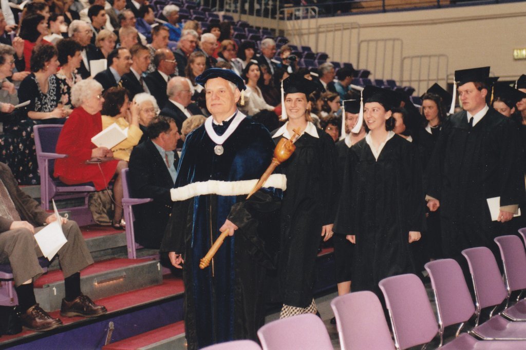 Doctor Thompson Faller leads the student procession at commencement.