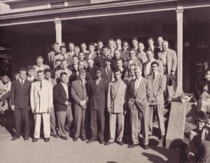 The 1949 football team toured 20th Century Fox studios prior to the football game at Pepperdine. At center of photo in hat is Bing Crosby next to Rev. Theodore Mehling, C.S.C, university president, October 21, 1949