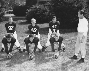 Six members of 1949 team with backfield coach Floyd Simmons 
