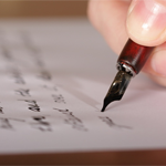 image of pen writing