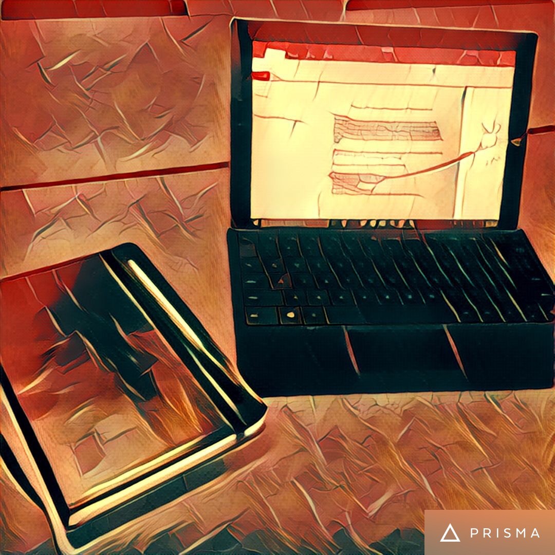 painterly image of a textbook and laptop